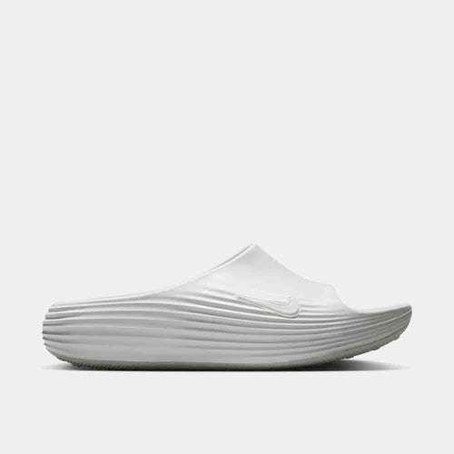 Side view of the Nike ReactX Rejuven8 Slides.