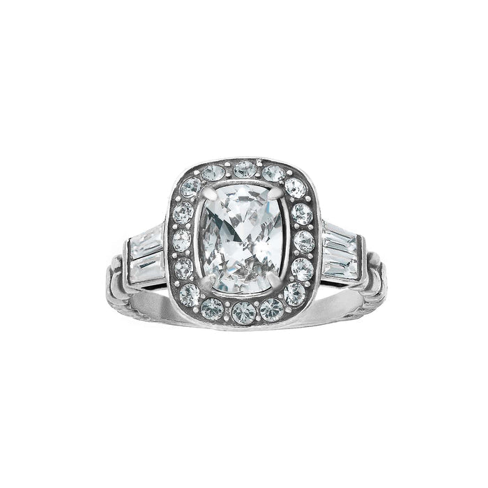 Brighton silver-plated ring with cushion-cut crystal center, halo of small crystals, and baguette side stones on a white background