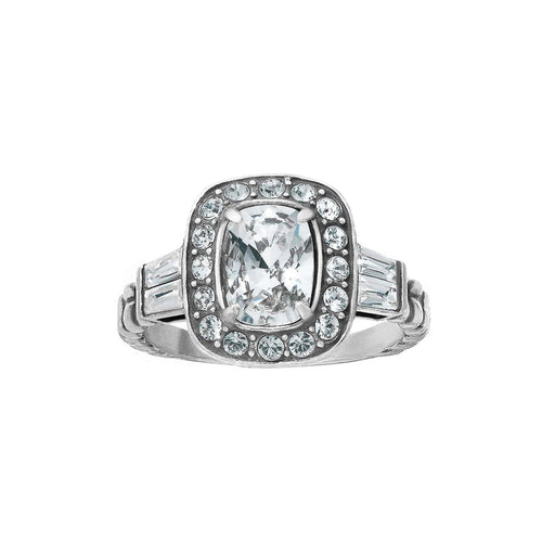 Brighton silver-plated ring with cushion-cut crystal center, halo of small crystals, and baguette side stones on a white background