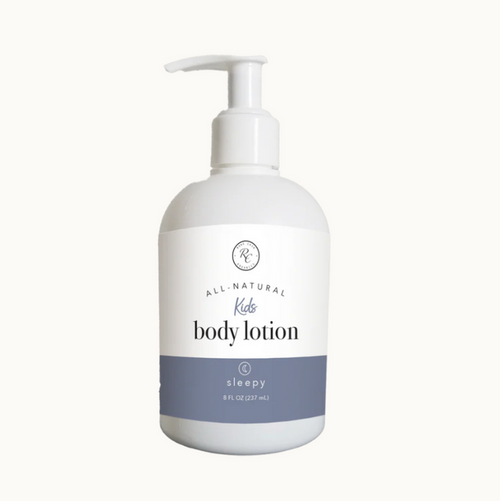 All natural body lotion bottle with pump on a white background