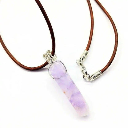 Silver Wrapped Light Amethyst Point Gemstone Necklace on a brown leather cord with a crystal pendant.