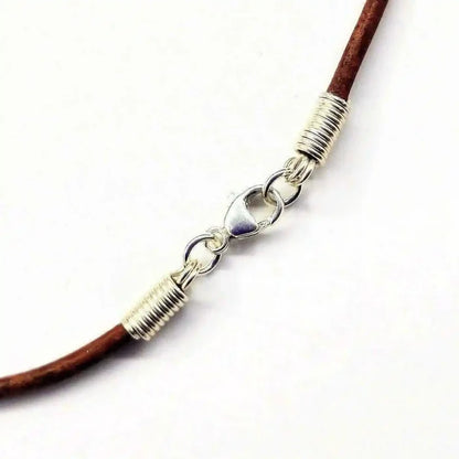 Silver Wrapped Purple Dyed Crackle Agate Point Necklace leather clasp detail