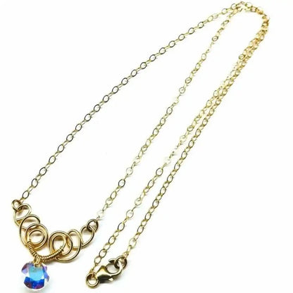 Sparkly Crystal AB Wire Sculpted 14 KT Gold Filled Necklace with elegant wire design and sparkling crystal centerpiece.