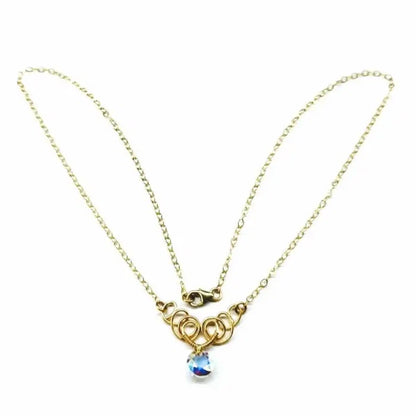 Sparkly Crystal AB Wire Sculpted 14 KT Gold Filled Necklace with gold chain and crystal pendant.