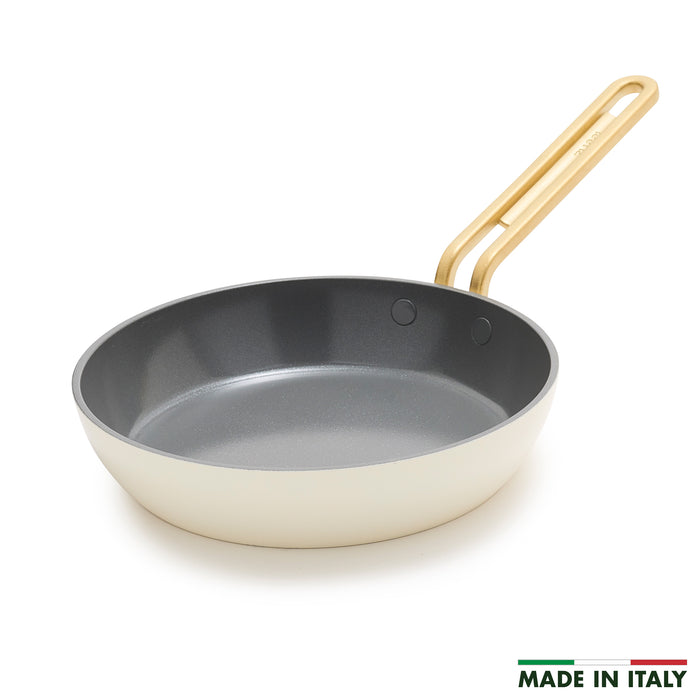 White ceramic 8-inch frypan with a gold handle, single piece shown.