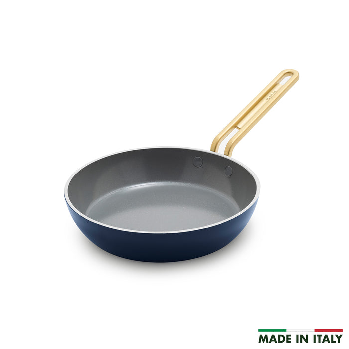Blue ceramic 8-inch frypan with a gold handle.