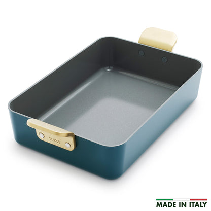 Venetian teal ceramic lasagna pan with gold handles, Made in Italy marked in the corner.