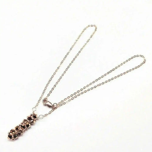 Super Sparkly Rose Gold Rock Candy Crystal Bar Necklace with shimmering Swarovski crystals on a delicate chain.