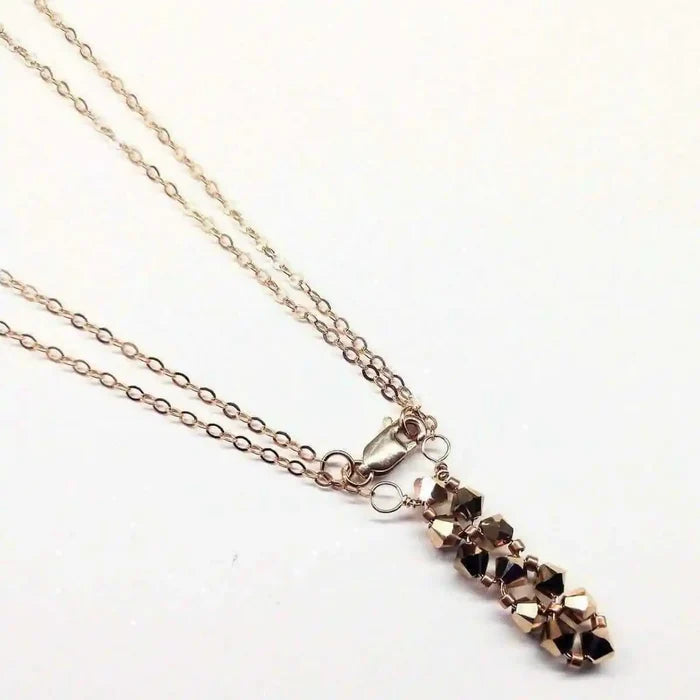 Super Sparkly Rose Gold Rock Candy Crystal Bar Necklace showcasing a vertical bar pendant with Swarovski crystals.
