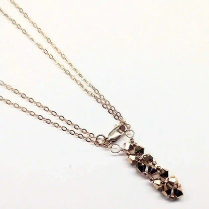 Super Sparkly Rose Gold Rock Candy Crystal Bar Necklace showcasing a vertical bar pendant with Swarovski crystals.