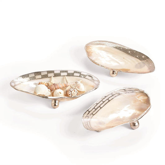Two's Company Ornamented Cabebe Shell Footed Dish with Silver Plated Trim.