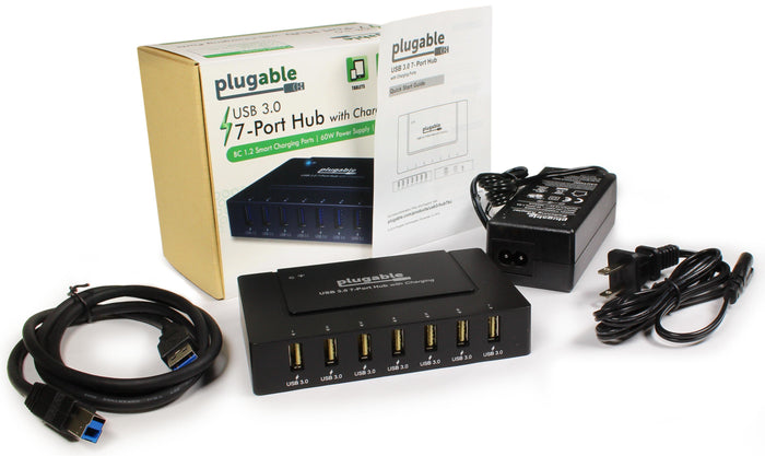 Plugable USB3-HUB7BC 7-port USB 3.0 hub with 60W power supply, charging ports, USB cable, and quick start guide.