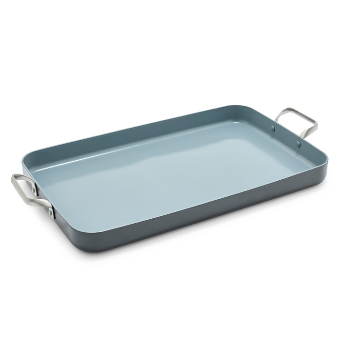 Rectangular ceramic nonstick griddle with two metal handles, sized to cover two burners.