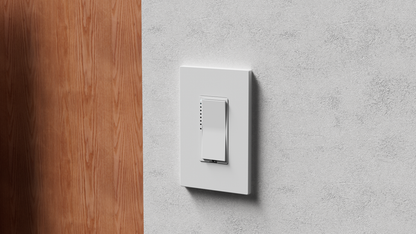 White dimmer switch on a wall